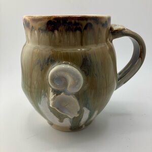 Handcrafted Ceramic Mug with Shell Design - Brown and Cream